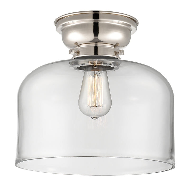 Bell Flush Mount shown in the Polished Nickel finish with a Clear shade