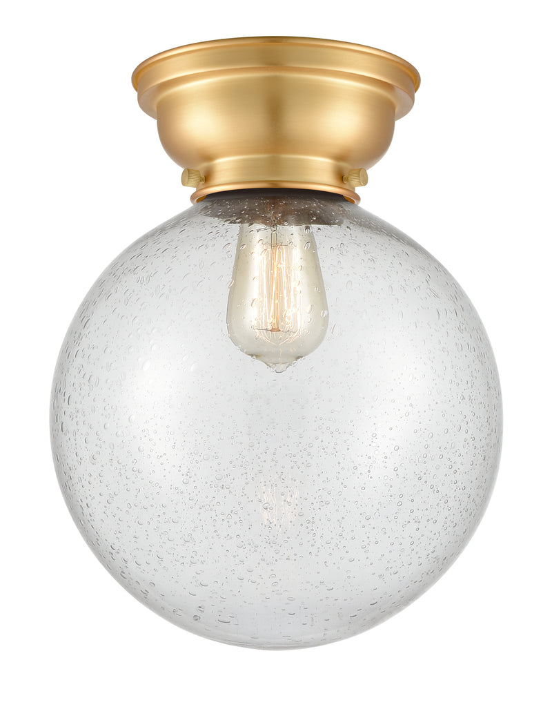 Beacon Flush Mount shown in the Satin Gold finish with a Seedy shade