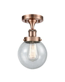 Beacon Semi-Flush Mount shown in the Antique Copper finish with a Seedy shade