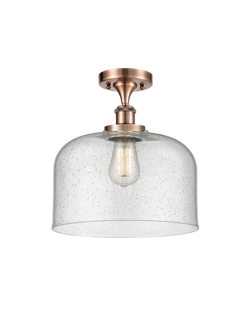 Bell Semi-Flush Mount shown in the Antique Copper finish with a Seedy shade