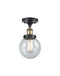 Beacon Semi-Flush Mount shown in the Black Antique Brass finish with a Seedy shade