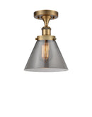 Cone Semi-Flush Mount shown in the Brushed Brass finish with a Plated Smoke shade