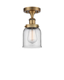 Bell Semi-Flush Mount shown in the Brushed Brass finish with a Clear shade