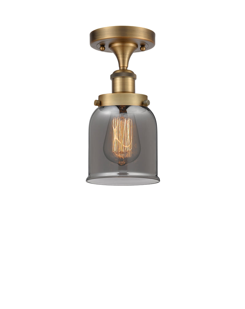 Bell Semi-Flush Mount shown in the Brushed Brass finish with a Plated Smoke shade