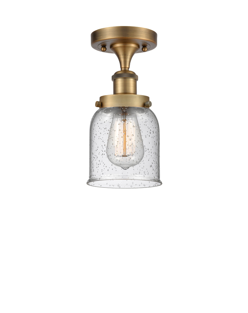 Bell Semi-Flush Mount shown in the Brushed Brass finish with a Seedy shade