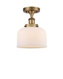 Bell Semi-Flush Mount shown in the Brushed Brass finish with a Matte White shade