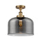 Bell Semi-Flush Mount shown in the Brushed Brass finish with a Plated Smoke shade