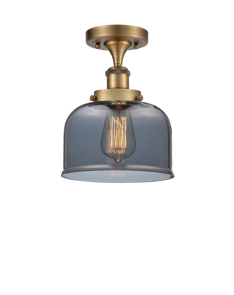 Bell Semi-Flush Mount shown in the Brushed Brass finish with a Plated Smoke shade