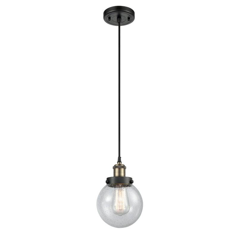 Beacon Mini Pendant shown in the Black Antique Brass finish with a Seedy shade