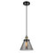 Cone Mini Pendant shown in the Black Antique Brass finish with a Plated Smoke shade