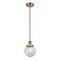 Beacon Mini Pendant shown in the Brushed Brass finish with a Seedy shade