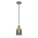 Bell Mini Pendant shown in the Brushed Brass finish with a Plated Smoke shade