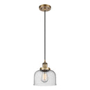 Bell Mini Pendant shown in the Brushed Brass finish with a Seedy shade