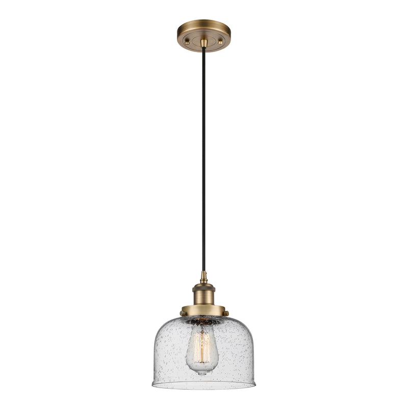 Bell Mini Pendant shown in the Brushed Brass finish with a Seedy shade