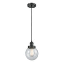 Beacon Mini Pendant shown in the Matte Black finish with a Seedy shade