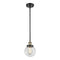 Beacon Mini Pendant shown in the Black Antique Brass finish with a Clear shade