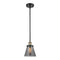 Cone Mini Pendant shown in the Black Antique Brass finish with a Plated Smoke shade