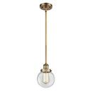 Beacon Mini Pendant shown in the Brushed Brass finish with a Clear shade