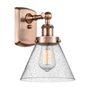 Cone Sconce shown in the Antique Copper finish with a Seedy shade