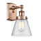 Cone Sconce shown in the Antique Copper finish with a Seedy shade