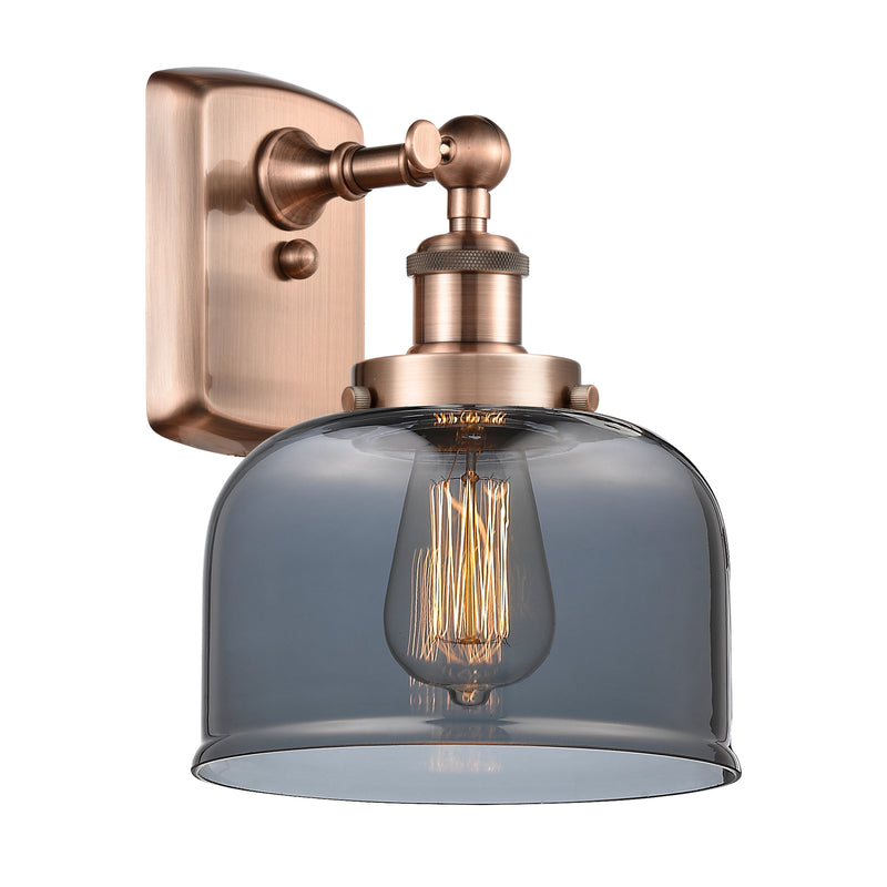 Bell Sconce shown in the Antique Copper finish with a Plated Smoke shade