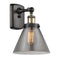 Cone Sconce shown in the Black Antique Brass finish with a Plated Smoke shade