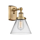 Cone Sconce shown in the Brushed Brass finish with a Clear shade