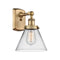 Cone Sconce shown in the Brushed Brass finish with a Clear shade