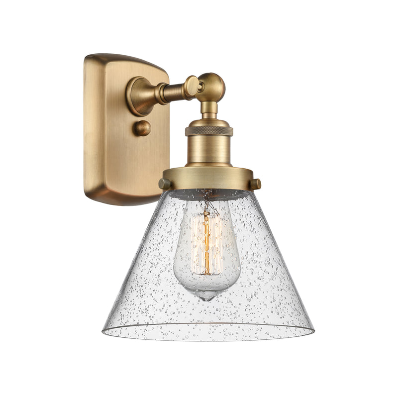 Cone Sconce shown in the Brushed Brass finish with a Seedy shade