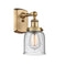 Bell Sconce shown in the Brushed Brass finish with a Seedy shade