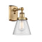 Cone Sconce shown in the Brushed Brass finish with a Seedy shade