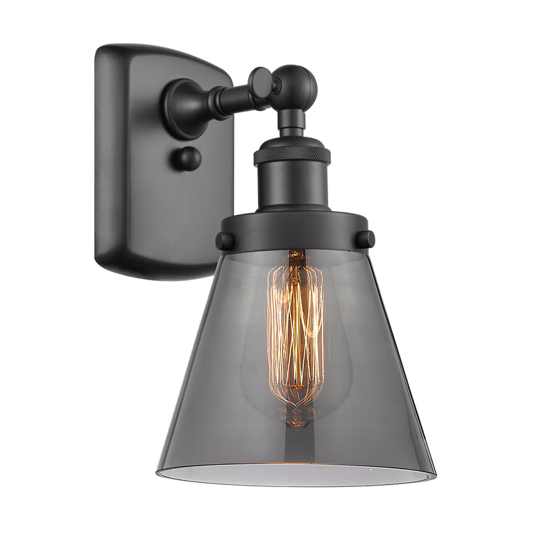 Cone Sconce shown in the Matte Black finish with a Plated Smoke shade