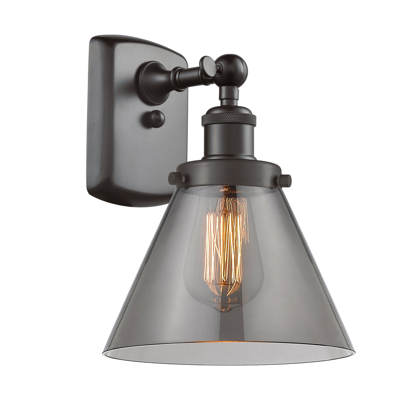 Cone Sconce shown in the Oil Rubbed Bronze finish with a Plated Smoke shade