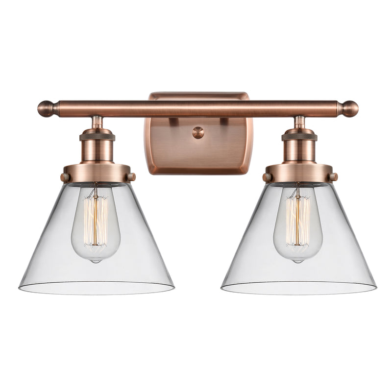 Cone Bath Vanity Light shown in the Antique Copper finish with a Clear shade