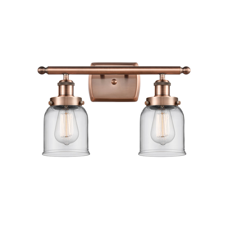 Bell Bath Vanity Light shown in the Antique Copper finish with a Clear shade