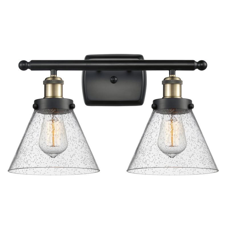 Cone Bath Vanity Light shown in the Black Antique Brass finish with a Seedy shade