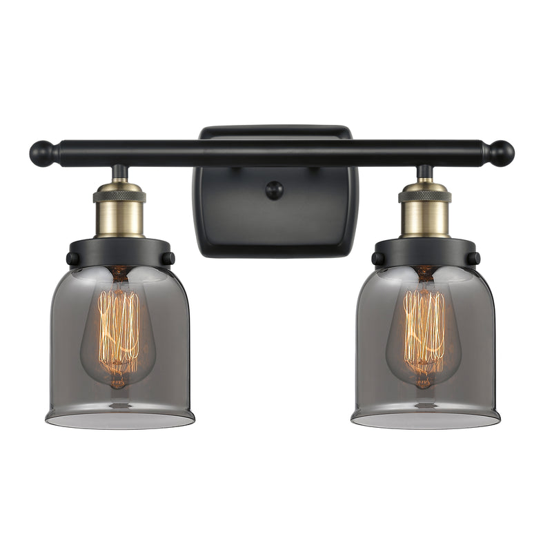 Bell Bath Vanity Light shown in the Black Antique Brass finish with a Plated Smoke shade