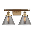 Cone Bath Vanity Light shown in the Brushed Brass finish with a Plated Smoke shade