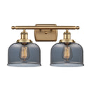 Bell Bath Vanity Light shown in the Brushed Brass finish with a Plated Smoke shade