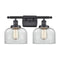 Bell Bath Vanity Light shown in the Matte Black finish with a Clear shade