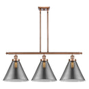 Cone Island Light shown in the Antique Copper finish with a Plated Smoke shade