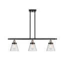 Cone Island Light shown in the Black Antique Brass finish with a Seedy shade