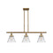 Cone Island Light shown in the Brushed Brass finish with a Clear shade