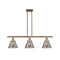 Cone Island Light shown in the Brushed Brass finish with a Plated Smoke shade