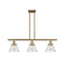 Cone Island Light shown in the Brushed Brass finish with a Seedy shade