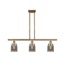 Bell Island Light shown in the Brushed Brass finish with a Plated Smoke shade