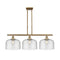 Bell Island Light shown in the Brushed Brass finish with a Seedy shade