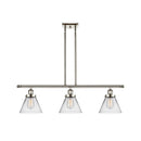 Cone Island Light shown in the Polished Nickel finish with a Clear shade