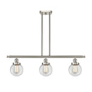 Beacon Island Light shown in the Brushed Satin Nickel finish with a Clear shade