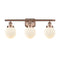 Beacon Bath Vanity Light shown in the Antique Copper finish with a Matte White shade